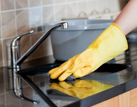 Window cleaner working on a home property in Finsbury Park