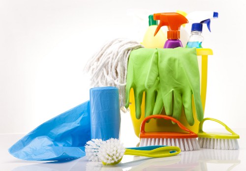 Detailed cleaning of work surfaces and communal areas in a local business premises